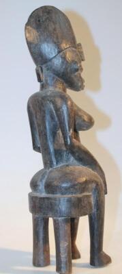 A 20thC carved African tribal figure - 2