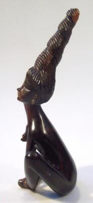 A heavily carved hardwood figure - 2