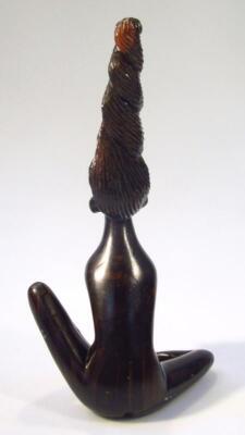 A heavily carved hardwood figure - 3