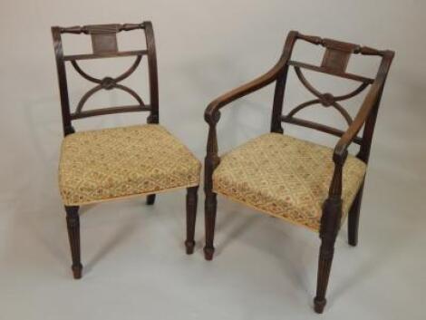 A set of eleven George IV mahogany dining chairs