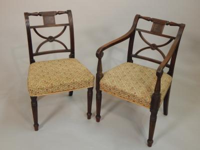 A set of eleven George IV mahogany dining chairs