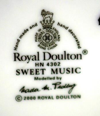 A Royal Doulton figure modelled as Sweet Music - 2