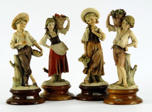 A set of four Capodimonte bisque porcelain figures