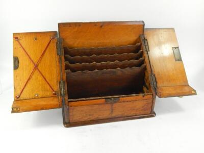 A Victorian oak stationery rack - 2