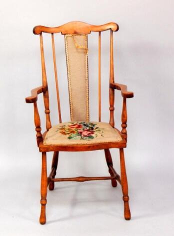 An Edwardian oak country chair