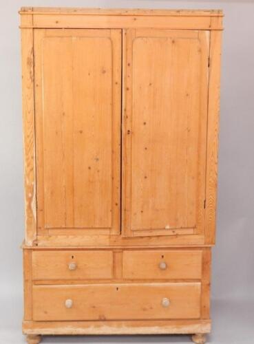 A Victorian pine double wardrobe