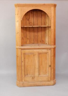 A Victorian pine corner cupboard