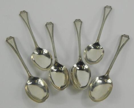 A composite set of six silver dessert spoons