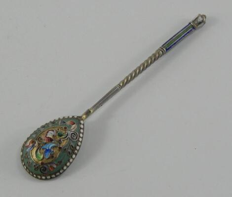 A Russian white metal and enamel spoon