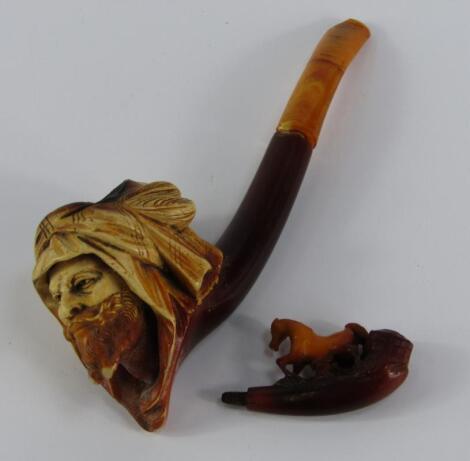 A Meerschaum pipe and a cheroot holder