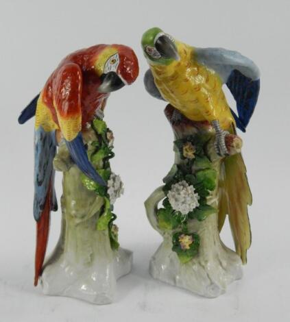 A pair of Sitzendorf Porcelain figures of Parakeets