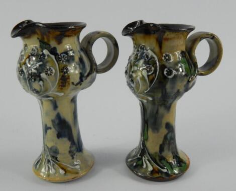 A pair of Stockley slipware jugs