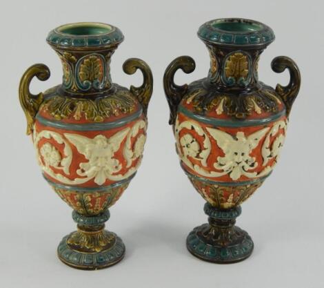 A pair of Continental majolica pottery vases