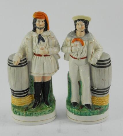 A pair of Staffordshire pottery flatback figures of sailors