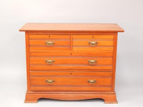 A Victorian satin walnut chest of drawers