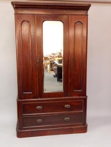 A Victorian oak double wardrobe