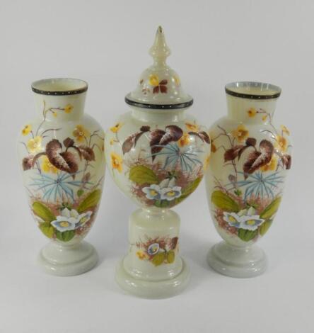 A Continental garniture of opaline glass vases