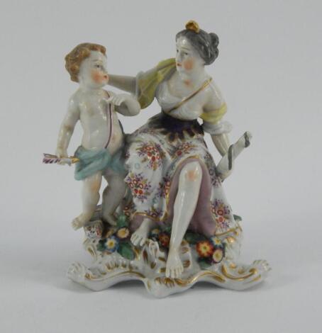 A Samson Chelsea porcelain figure group of Cupid and Psyche