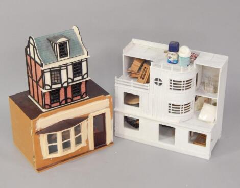 Three partially made doll's houses or scale model shops