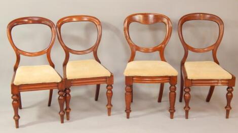 A set of four Victorian single mahogany balloon back dining chairs