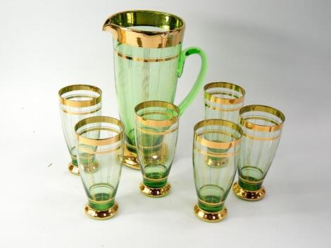 A Continental green glass lemonade set