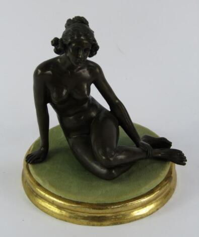 A bronze figure of a naked lady
