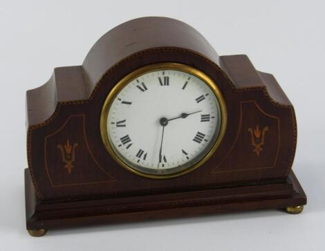 An Edwardian mahogany and inlaid mantel clock