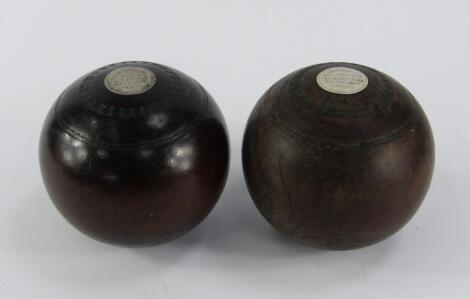 A pair of lignum vitae bowls