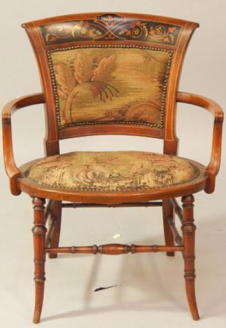 A Victorian mahogany and inlaid armchair