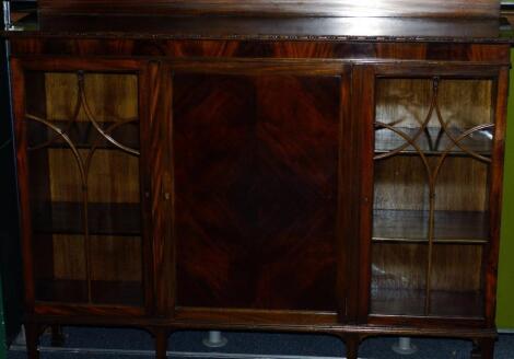 A mahogany display cabinet