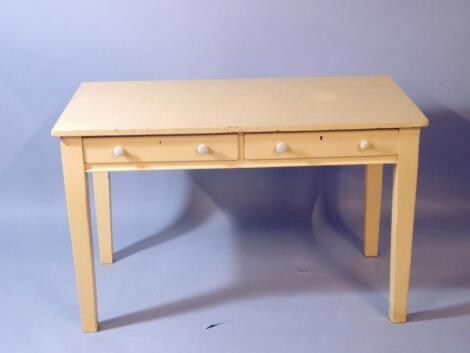 A Victorian yellow painted kitchen table