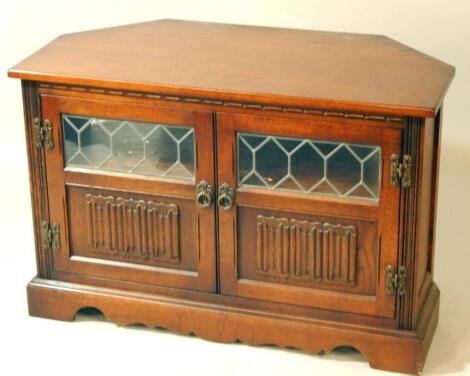 An Old Charm oak television cabinet