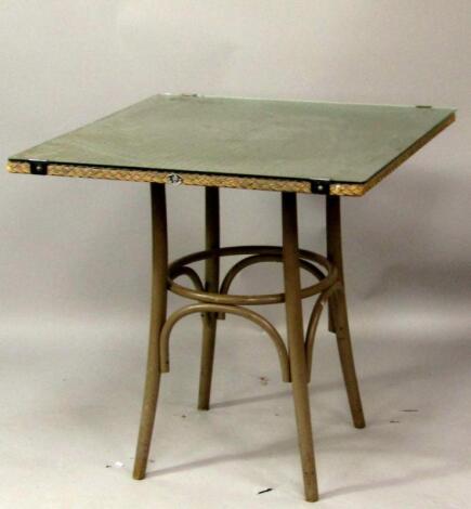 A Lloyd Loom bistro table