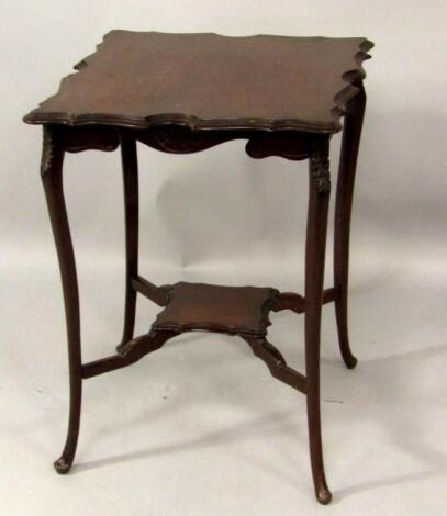 A Victorian mahogany two tier occasional table