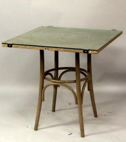 A Lloyd Loom bistro table