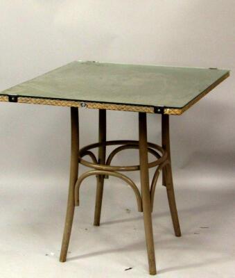 A Lloyd Loom bistro table