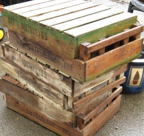 A set of six wooden fruit crates