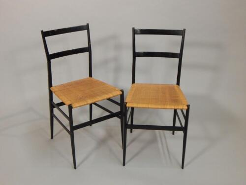 A pair of Gio Ponti Super Leggera ebonised chairs