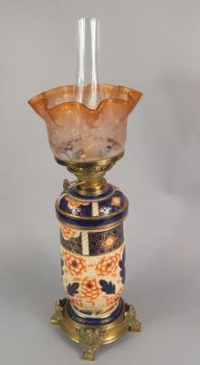 A late Victorian / Edwardian pottery oil lamp