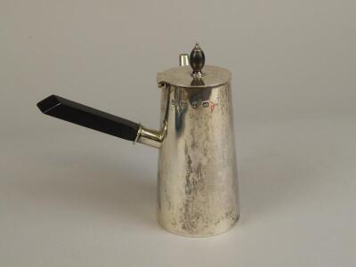 A Victorian silver chocolate pot in the manner of Dr Christopher Dresser - 2