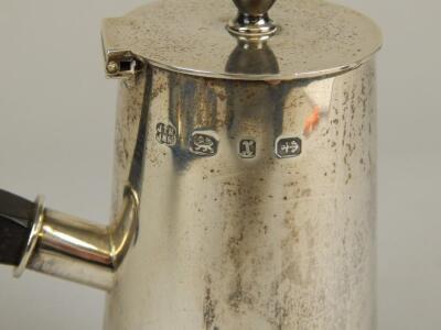 A Victorian silver chocolate pot in the manner of Dr Christopher Dresser - 3