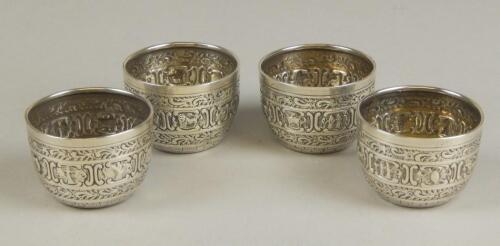 A set of four Victorian silver small cups