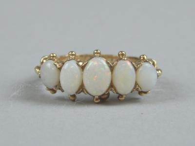 A Victorian 9ct gold opal dress ring