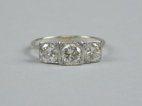 An Art Deco three stone diamond ring