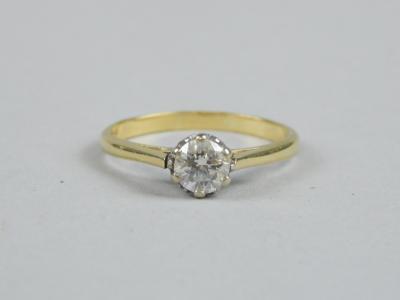 An 18ct gold diamond solitaire ring