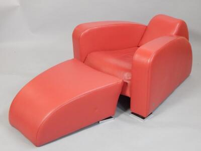 A Kler modern red leather armchair