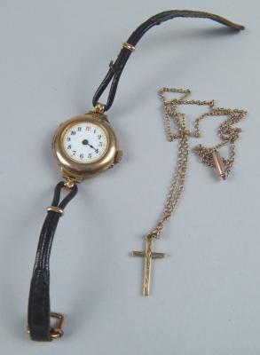 A ladies wristwatch and 9ct gold chain