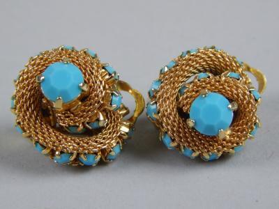 A pair of costume clip on earrings