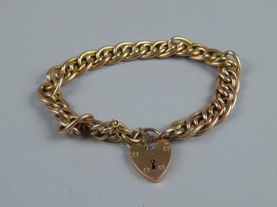 A 9ct gold charm bracelet