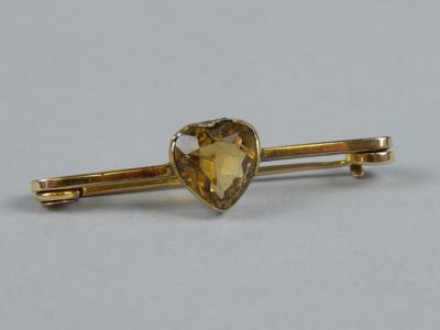 A bar brooch